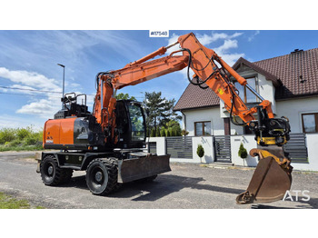 Колёсный экскаватор HITACHI ZX140W-6