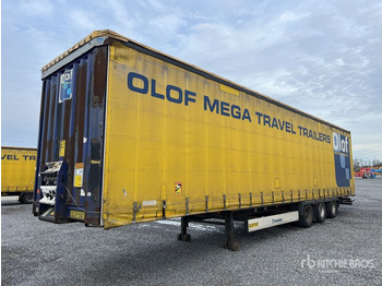 Тентованный прицеп KRONE