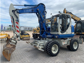 Колёсный экскаватор WACKER