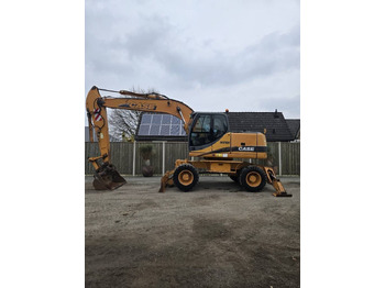 Колёсный экскаватор CASE