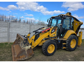 Экскаватор-погрузчик CATERPILLAR