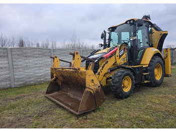 Экскаватор-погрузчик CATERPILLAR