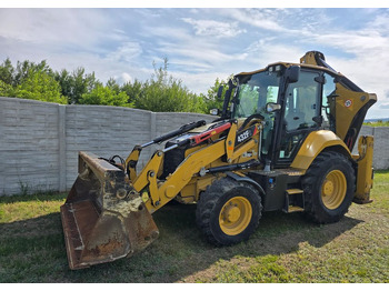 Экскаватор-погрузчик CATERPILLAR