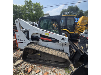 Мини-погрузчик с бортовым поворотом BOBCAT