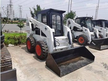 Мини-погрузчик с бортовым поворотом Bobcat S130: фото 5