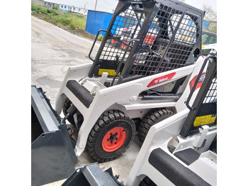 Мини-погрузчик с бортовым поворотом Bobcat S70: фото 5 Мини-погрузчик с бортовым поворотом Bobcat S70: фото 5