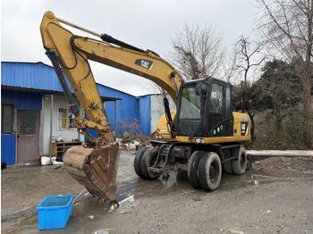 Колёсный экскаватор CATERPILLAR M315D