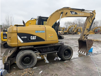 Колёсный экскаватор CATERPILLAR M315D