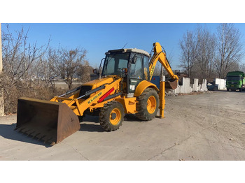 Экскаватор-погрузчик NEW HOLLAND