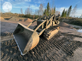 Гусеничный погрузчик CATERPILLAR