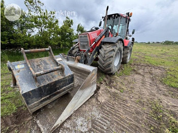 Экскаватор-погрузчик HUDDIG