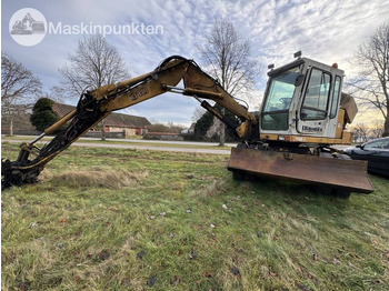 Колёсный экскаватор LIEBHERR