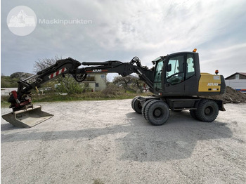 Колёсный экскаватор TEREX