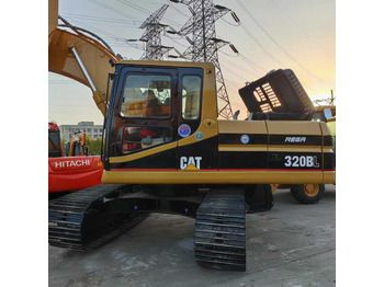 Экскаватор CATERPILLAR