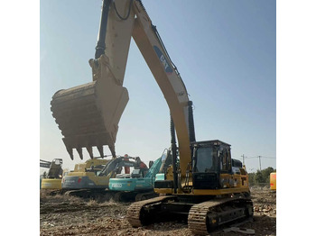 Гусеничный экскаватор CATERPILLAR