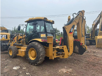 Экскаватор-погрузчик CATERPILLAR