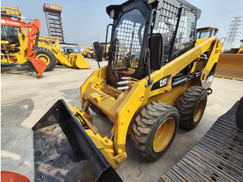 Мини-погрузчик с бортовым поворотом CATERPILLAR