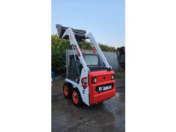 Мини-погрузчик с бортовым поворотом BOBCAT S100