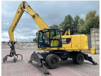 Колёсный экскаватор CATERPILLAR