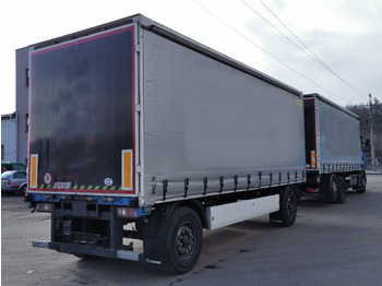 Тентованный прицеп KRONE