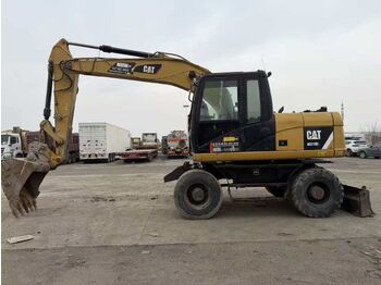 Колёсный экскаватор CATERPILLAR M315D