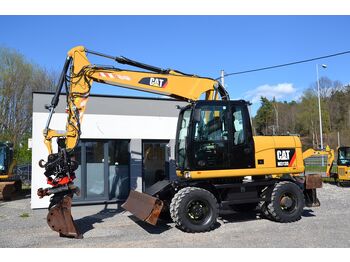 Колёсный экскаватор CATERPILLAR M313D