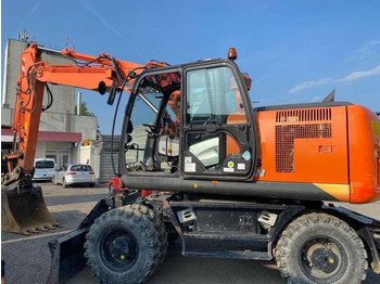 Колёсный экскаватор HITACHI ZX170W