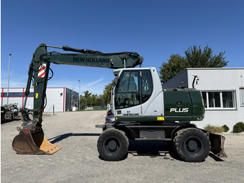 Колёсный экскаватор NEW HOLLAND