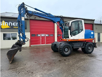 Колёсный экскаватор TEREX