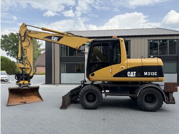 Колёсный экскаватор CATERPILLAR M313D