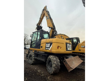 Колёсный экскаватор CATERPILLAR 313D