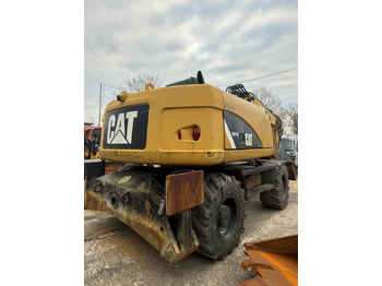 Колёсный экскаватор CATERPILLAR 313D