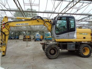 Колёсный экскаватор NEW HOLLAND