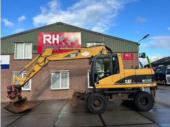 Колёсный экскаватор CATERPILLAR M315C