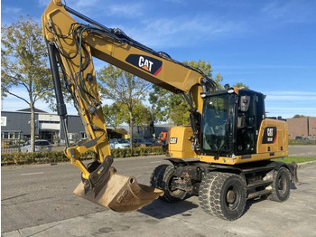 Колёсный экскаватор CATERPILLAR M318F