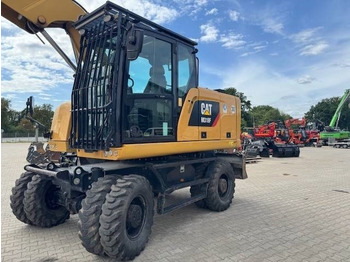 Колёсный экскаватор CATERPILLAR M318F