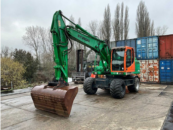 Колёсный экскаватор HYUNDAI