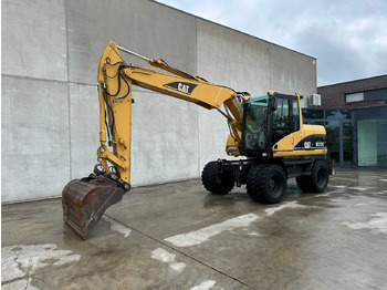 Колёсный экскаватор CATERPILLAR M313C