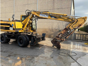 Колёсный экскаватор CATERPILLAR M315
