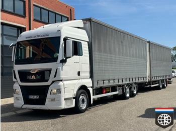 Тентованный грузовик MAN TGX 26.480