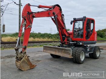 Колёсный экскаватор WACKER