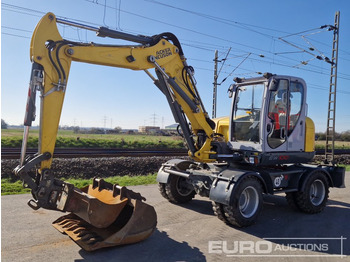 Колёсный экскаватор WACKER