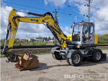 Колёсный экскаватор WACKER