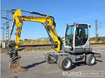 Колёсный экскаватор WACKER