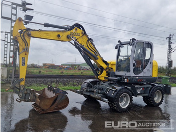 Колёсный экскаватор WACKER