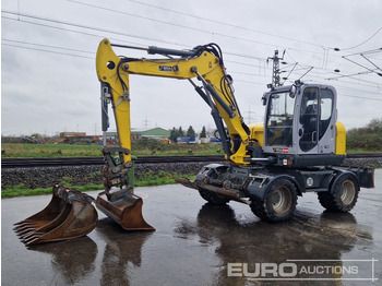 Колёсный экскаватор WACKER