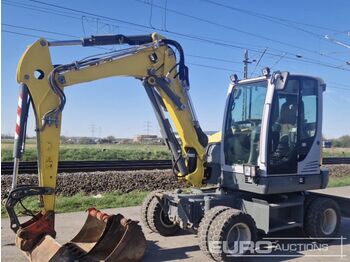 Колёсный экскаватор WACKER