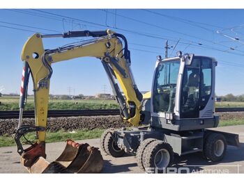Колёсный экскаватор WACKER