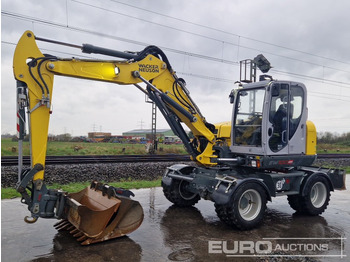 Колёсный экскаватор WACKER