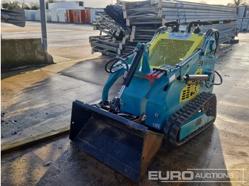 Мини-погрузчик с бортовым поворотом